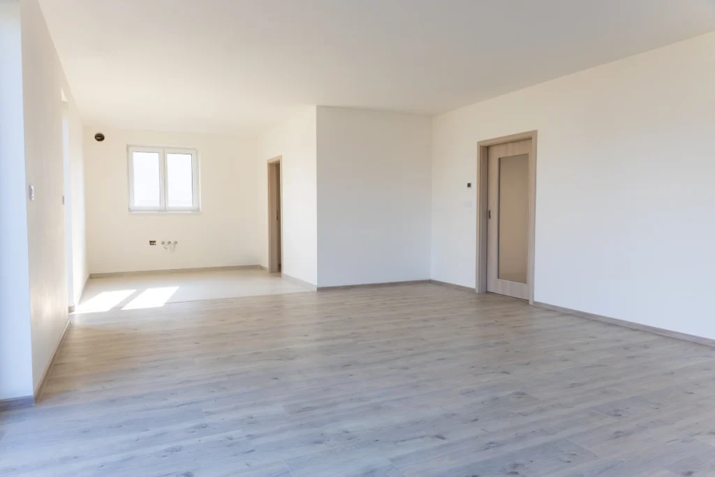 Obývací pokoj s pohledem na kuchyň v rodinném domě RD Kostelec nad Labem.